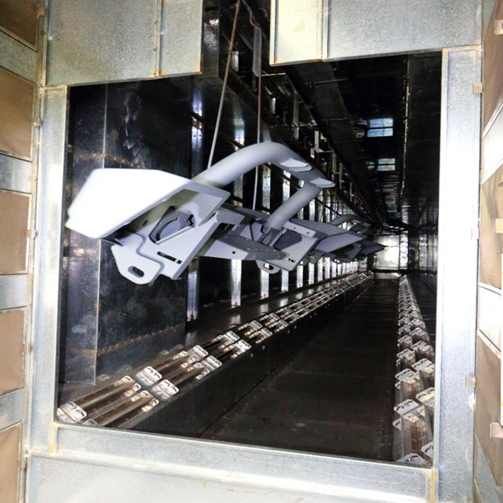 Conveyor oven with suspended components
